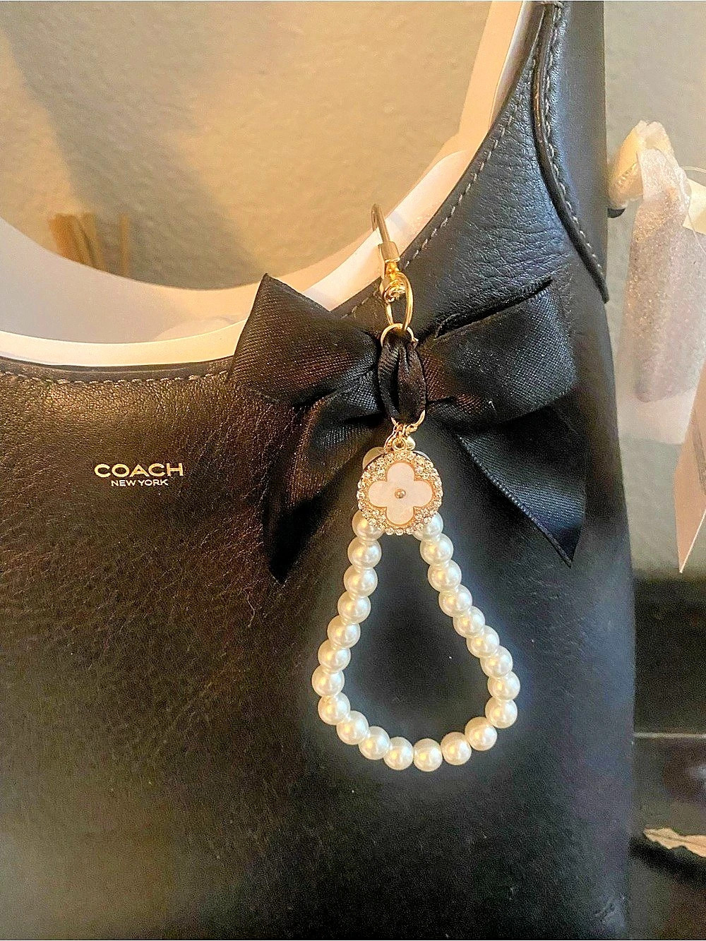 Bag charm black bow with pearls and clover